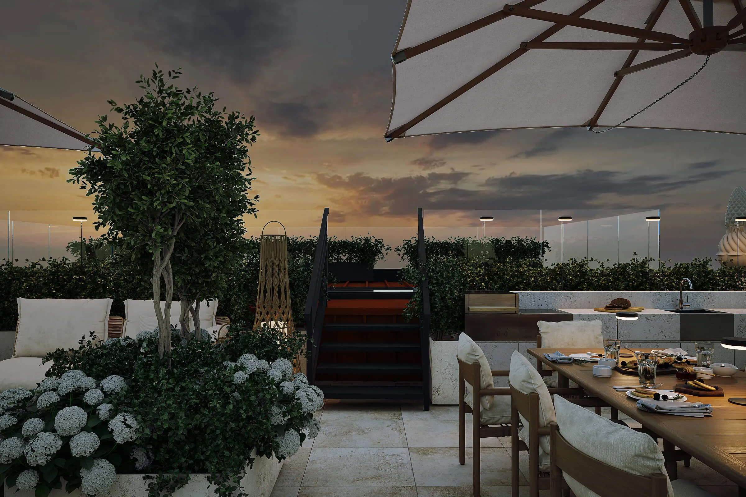 Penthouse Terrace — Zurich. Outdoor evening patio with cushioned wooden chairs and table set for dinner, large umbrellas, potted plants with white flowers, and stairs leading up at sunset.