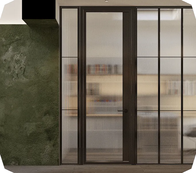 Modern black-framed glass door with frosted panels set in a wall with dark green textured paint.